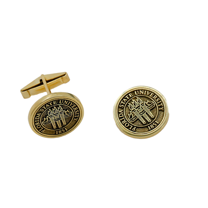 Gold Florida State University cufflinks on a white background