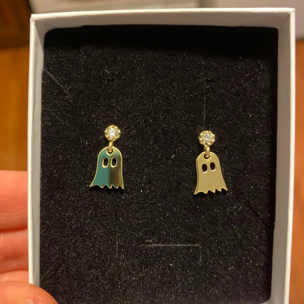 Ghost-shaped earrings in a box