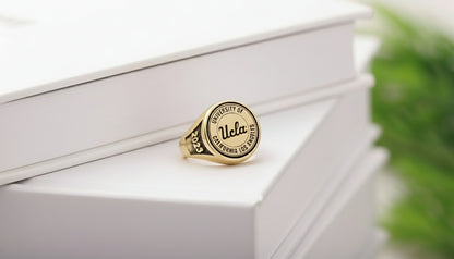 A close-up image of a Ucla University signet ring
