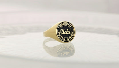 A close-up image of a Ucla University signet ring