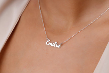 Silver 'Emilie' necklace on a person's neck