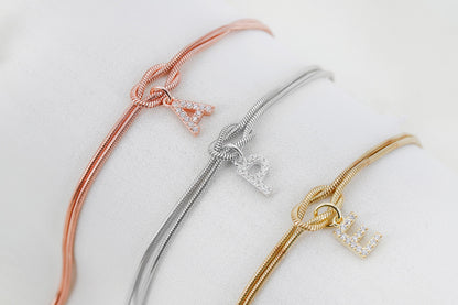 Custom 14K Gold Infinite Love Knot Bracelet with CZ Diamond Letter by NecklaceDreamWorld | Dainty Friendship Bracelets - silvergoldandrose