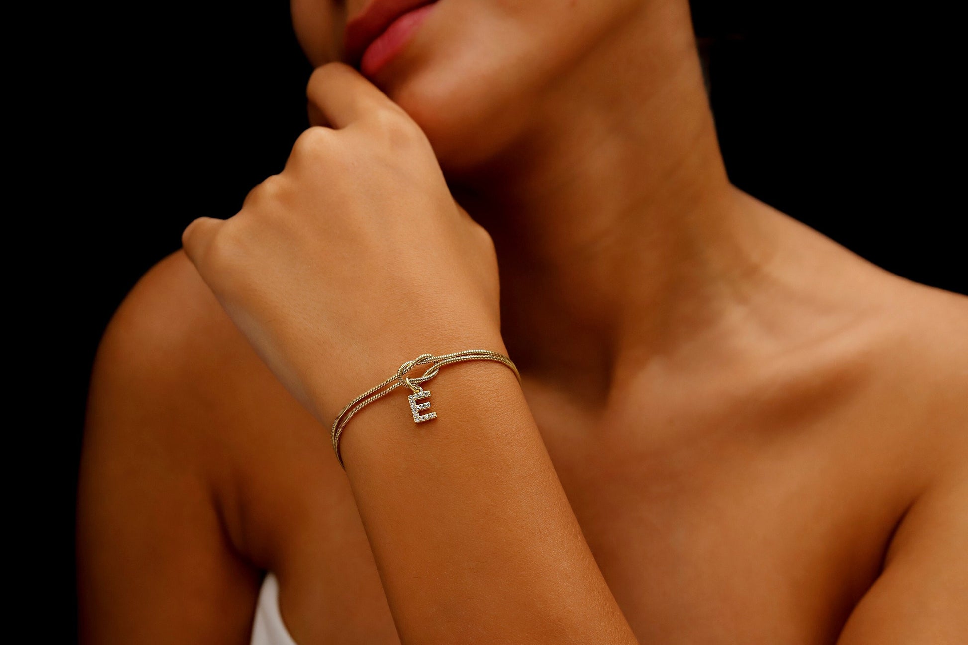 Custom 14K Gold Infinite Love Knot Bracelet with CZ Diamond Letter by NecklaceDreamWorld | Dainty Friendship Bracelets - silvergoldandrose