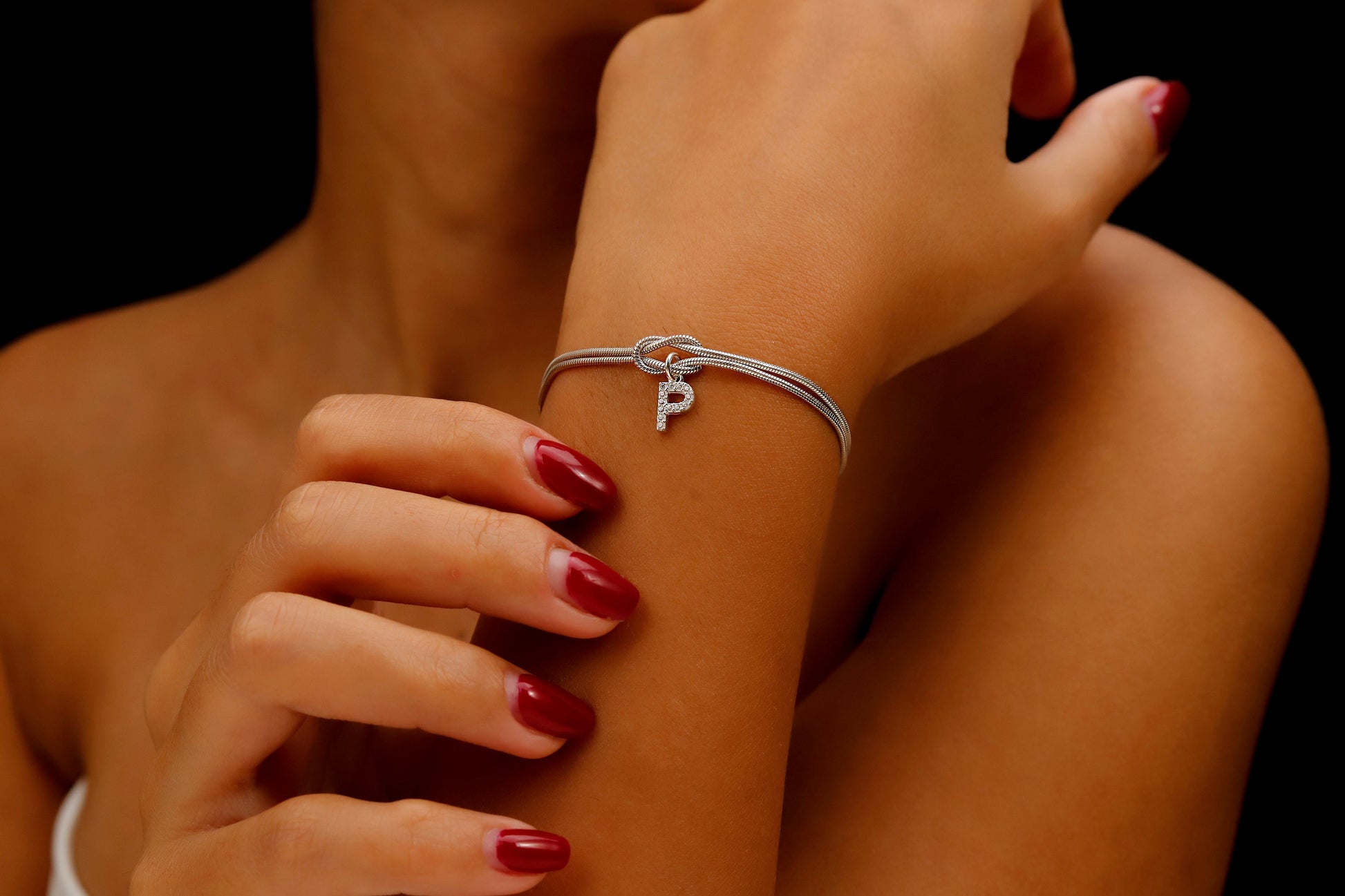 Custom 14K Gold Infinite Love Knot Bracelet with CZ Diamond Letter by NecklaceDreamWorld | Dainty Friendship Bracelets - silvergoldandrose