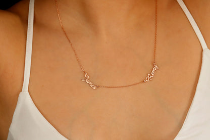 A custom multiple name plate choker necklace in gold finish, featuring two name plates on a person's neck.