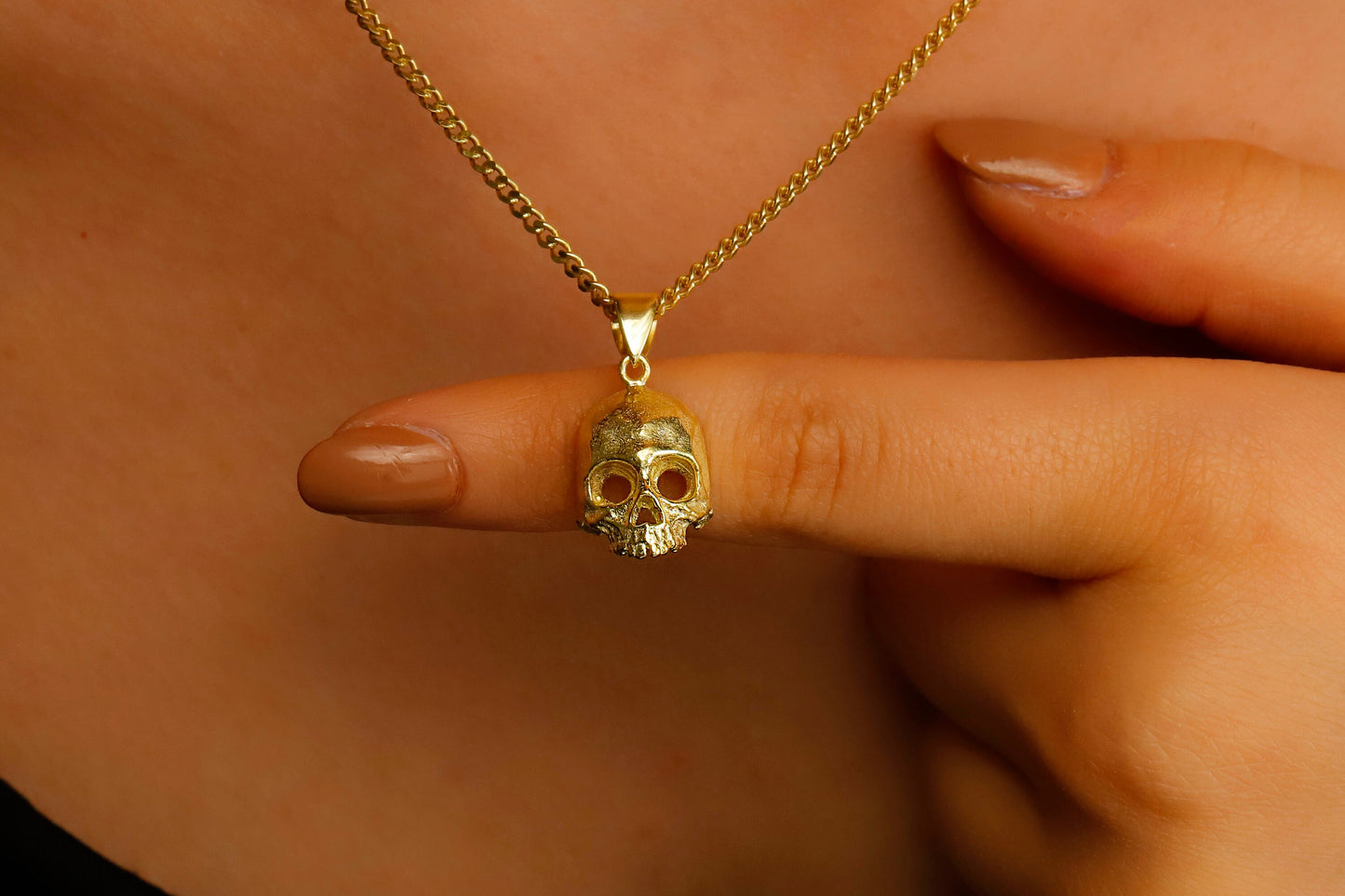Skull Charm Necklace by [Brand Name] - Daring Elegance with a Touch of Edge