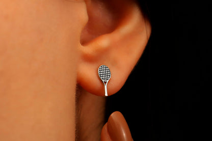 A close-up image of a 925 sterling silver tennis racket stud earring.